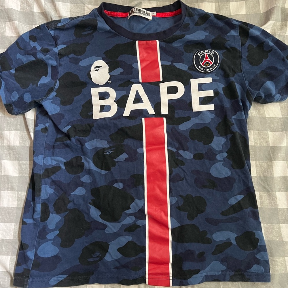 BAPE x PSG tee. You can Buy a New One from 230-400.